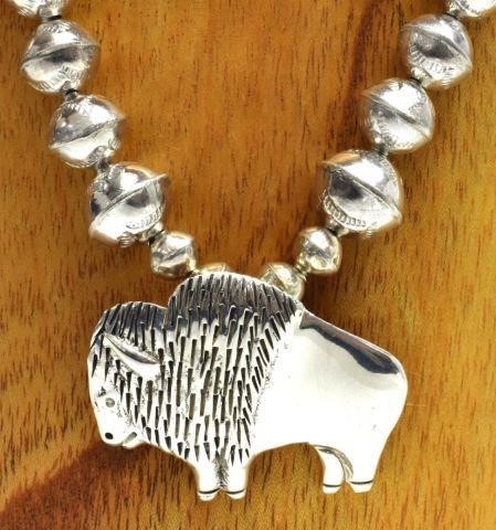 Appraisal: Native American silver content unknown necklace sterling bison pendant brooch