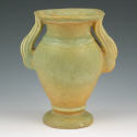 Appraisal: Niloak flame handled vase with green and tan matte glaze