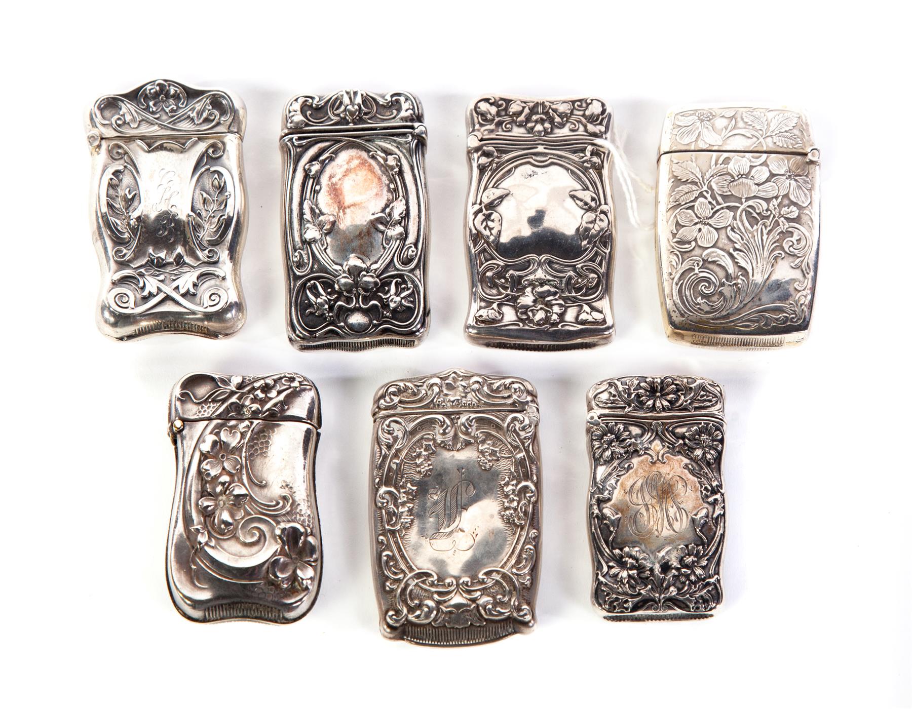 Appraisal: SEVEN VARIOUS STERLING ART NOUVEAU MATCH SAFES American ca Many