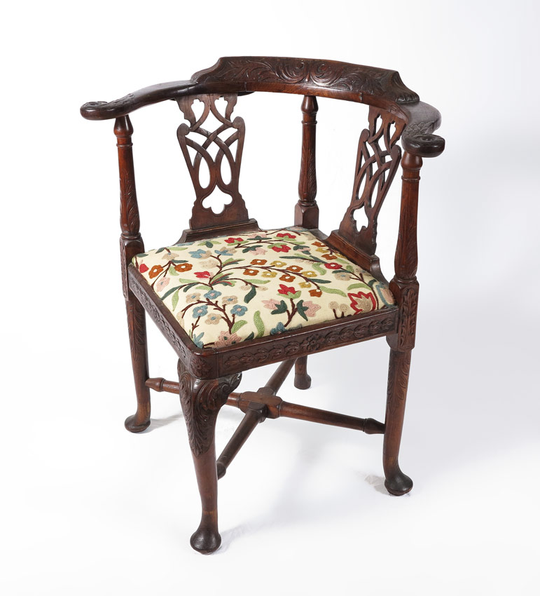 Appraisal: CHIPPENDALE PERIOD CARVED CORNER CHAIR Carved crest with shaped arms