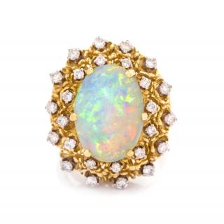 Appraisal: A Yellow Gold Opal and Diamond Ring La Triomphe dwts