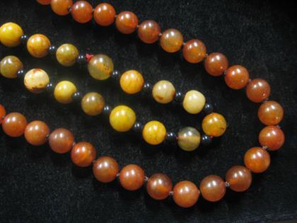 Appraisal: Set of sard or red agate necklaces Both composed of