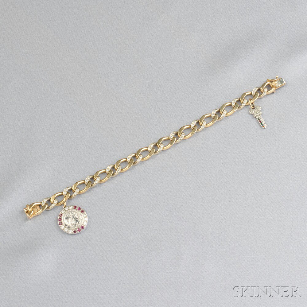 Appraisal: kt Gold and Diamond Bracelet with Platinum Charms a key