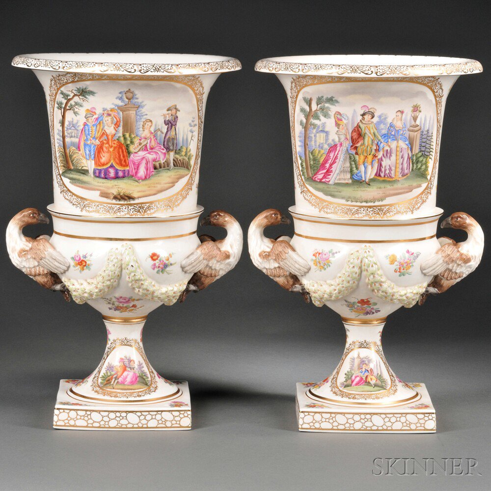 Appraisal: Pair of German Hand-painted Porcelain Urns th century each with