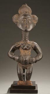 Appraisal: Asante style standing female figure th c Asante style terracotta