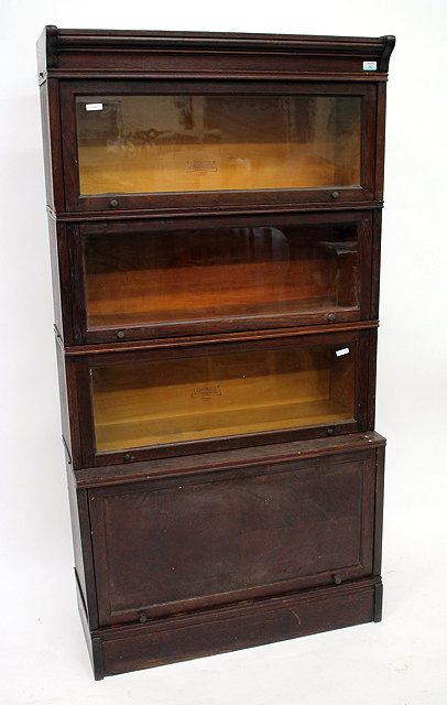 Appraisal: AN EARLY TO MID TH CENTURY OAK SECTIONAL BOOKCASE with