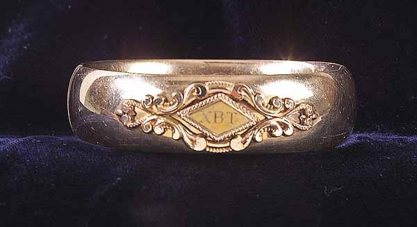 Appraisal: A Victorian Gold-Filled Bangle Bracelet with hinged side and applied