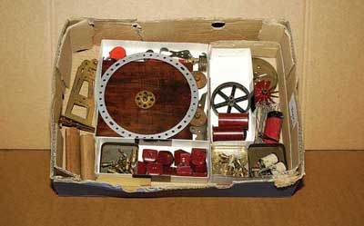 Appraisal: Meccano quantity of Pre-war special parts including red pulley ship's