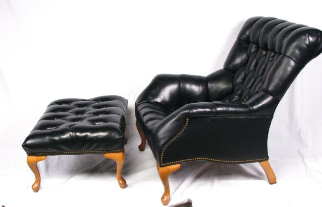 Appraisal: Vintage black leather chair neo-classic style deep seat club chair