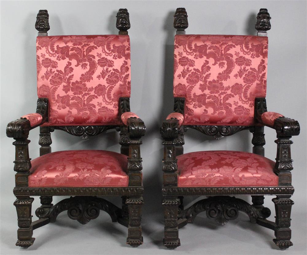 Appraisal: PAIR OF CONTINENTAL BAROQUE WALNUT THRONE CHAIRS th Century upholstered