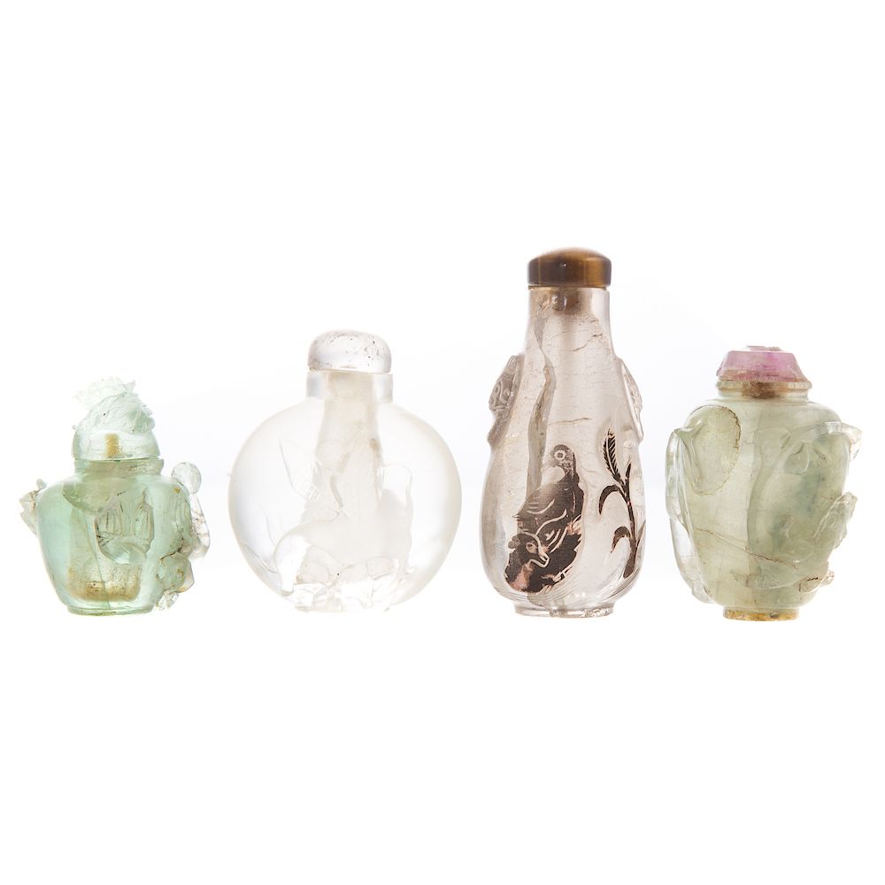 Appraisal: Four Chinese Carved Glass or Stone Snuff Bottles to in