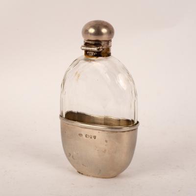 Appraisal: A Victorian silver mounted cut glass hip flask JNM London