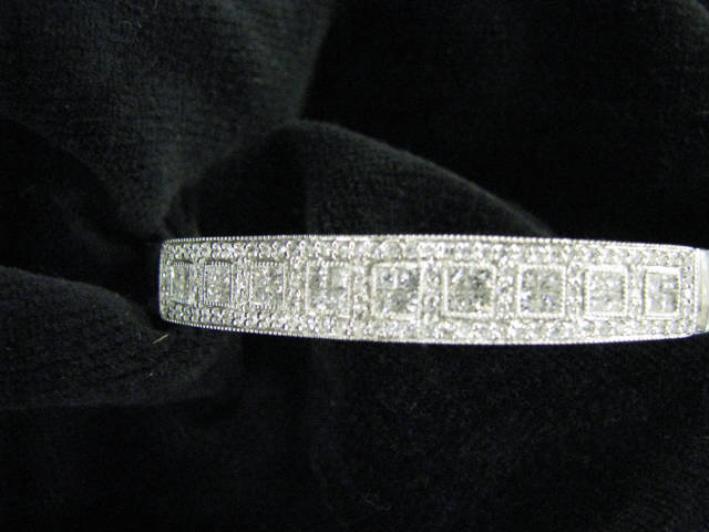 Appraisal: Diamond Bangle Bracelet princess round diamonds totaling carats in k