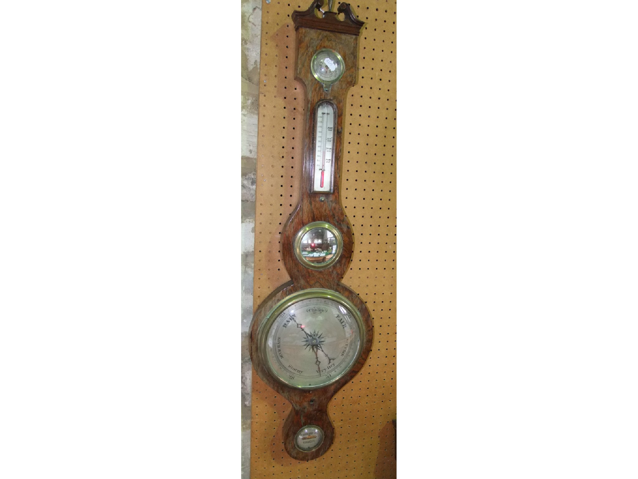 Appraisal: A th century rosewood wheel barometer with silvered dials and