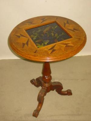 Appraisal: A VICTORIAN SATINWOOD TRIPOD TABLE the circular tip up parquetry