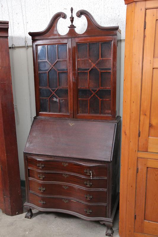 Appraisal: SECRETARY BOOKCASE Mahogany having a broken arch pediment glazed doors