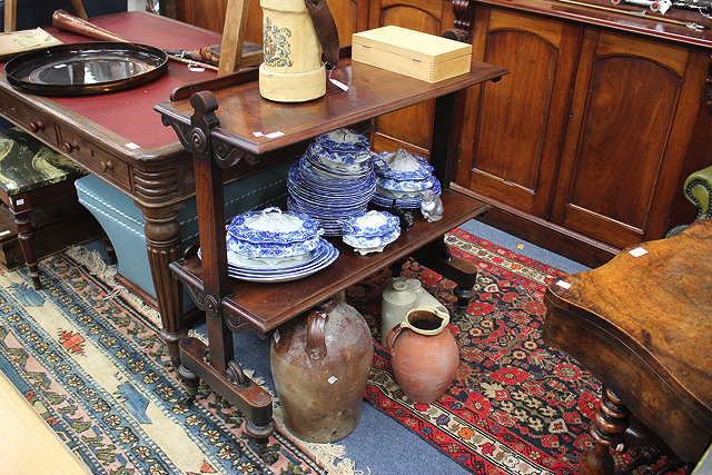 Appraisal: A TH CENTURY MAHOGANY TWO TIERED BUFFET with galleried back