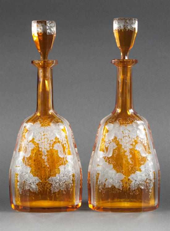 Appraisal: Pair of Bohemian stained amber etched cut to clear glass