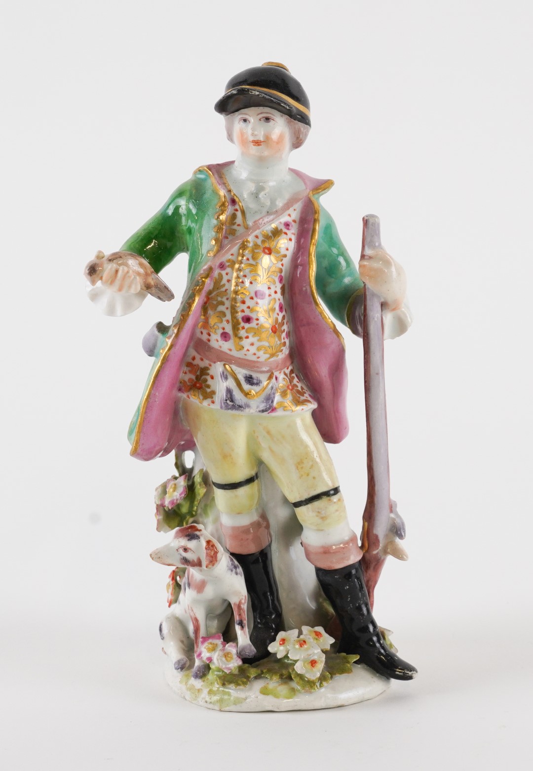 Appraisal: A BOW FIGURE OF A SPORTSMAN Circa Modelled standing with