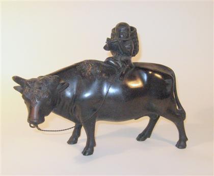 Appraisal: Japanese bronze bull and riderearly th century