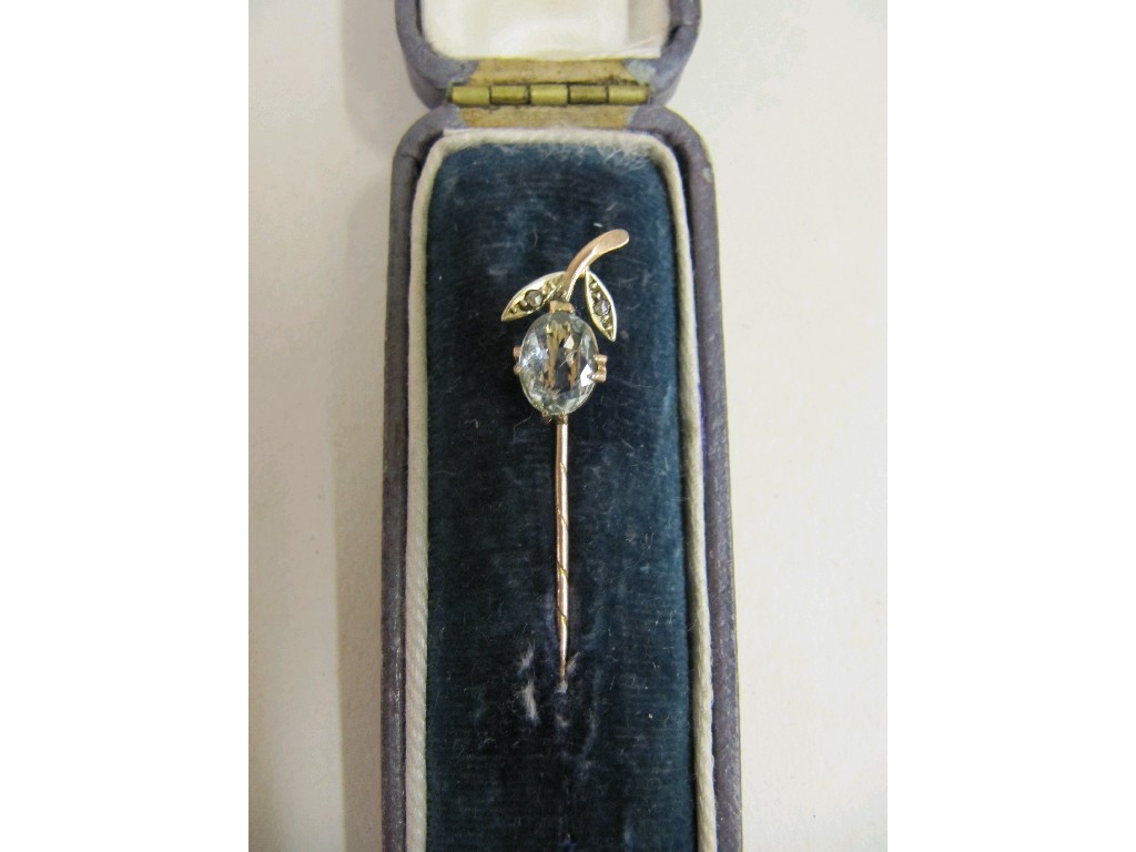 Appraisal: Gold stick pin with aquamarine and diamond set stick pin