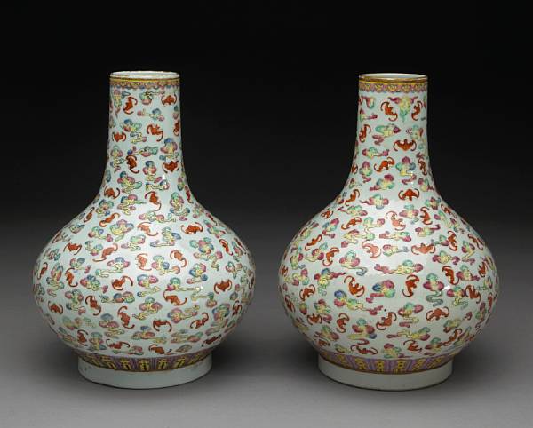 Appraisal: A pair of famille rose enameled porcelain bottle vases Guangxu