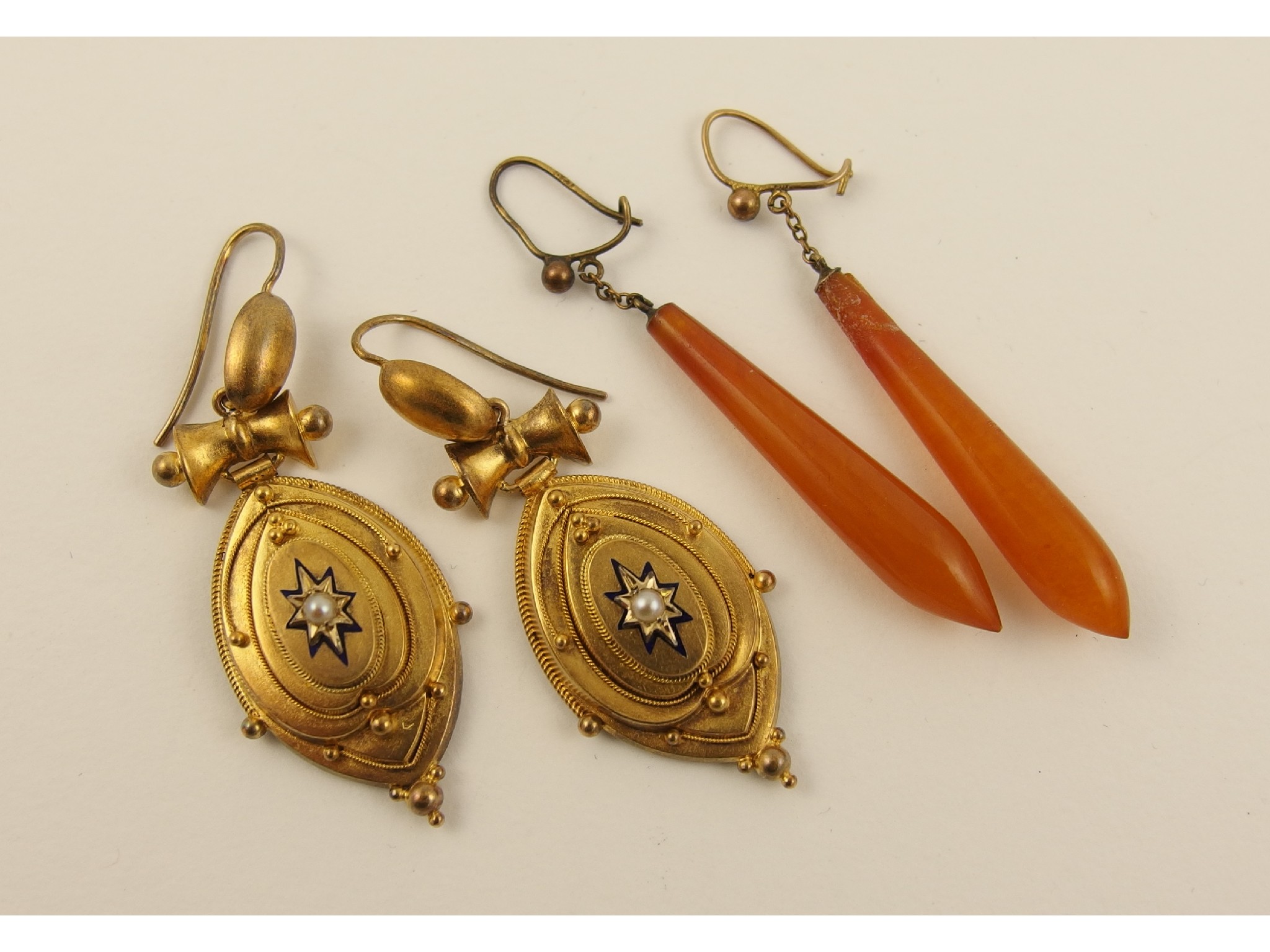 Appraisal: A pair of Victorian yellow metal earrings set with split