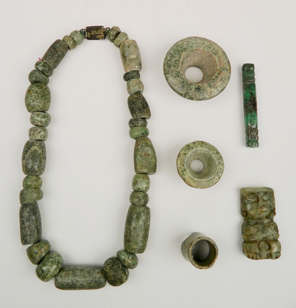 Appraisal: Pre-Columbian jade-ite items Pre-Columbian jade-ite items- Tubular Mayan bead and