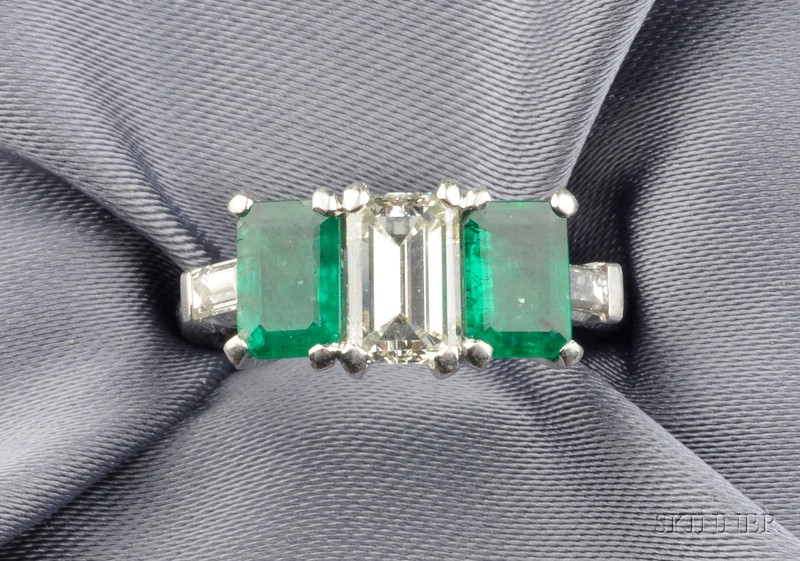 Appraisal: Platinum Diamond and Emerald Three-stone Ring prong-set with two emerald-cut