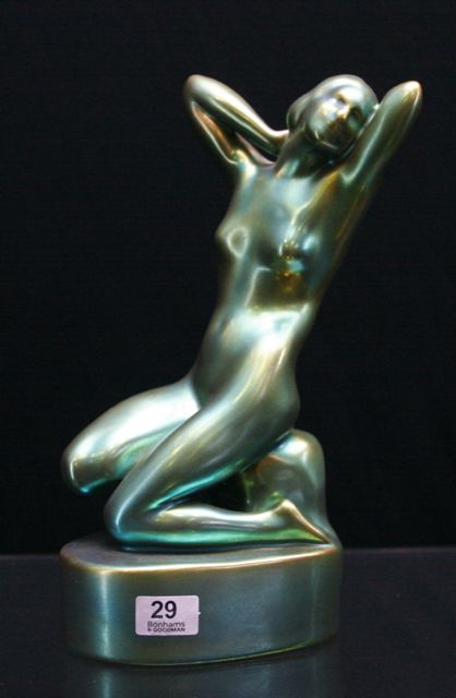 Appraisal: A Zsolnay figure of a seated nude circa in turquoise