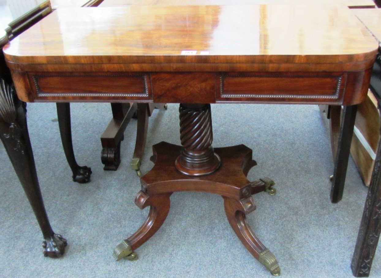 Appraisal: A George III mahogany card table the foldover 'D' shaped