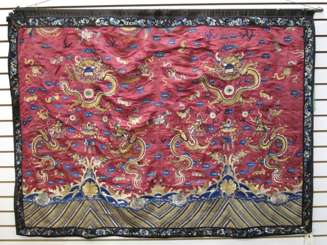 Appraisal: EARLY CHINESE EMBROIDERY WALL HANGING a dragon pictorial using gold