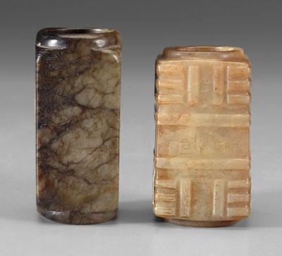 Appraisal: Two Chinese hardstone congs both of square section one pale