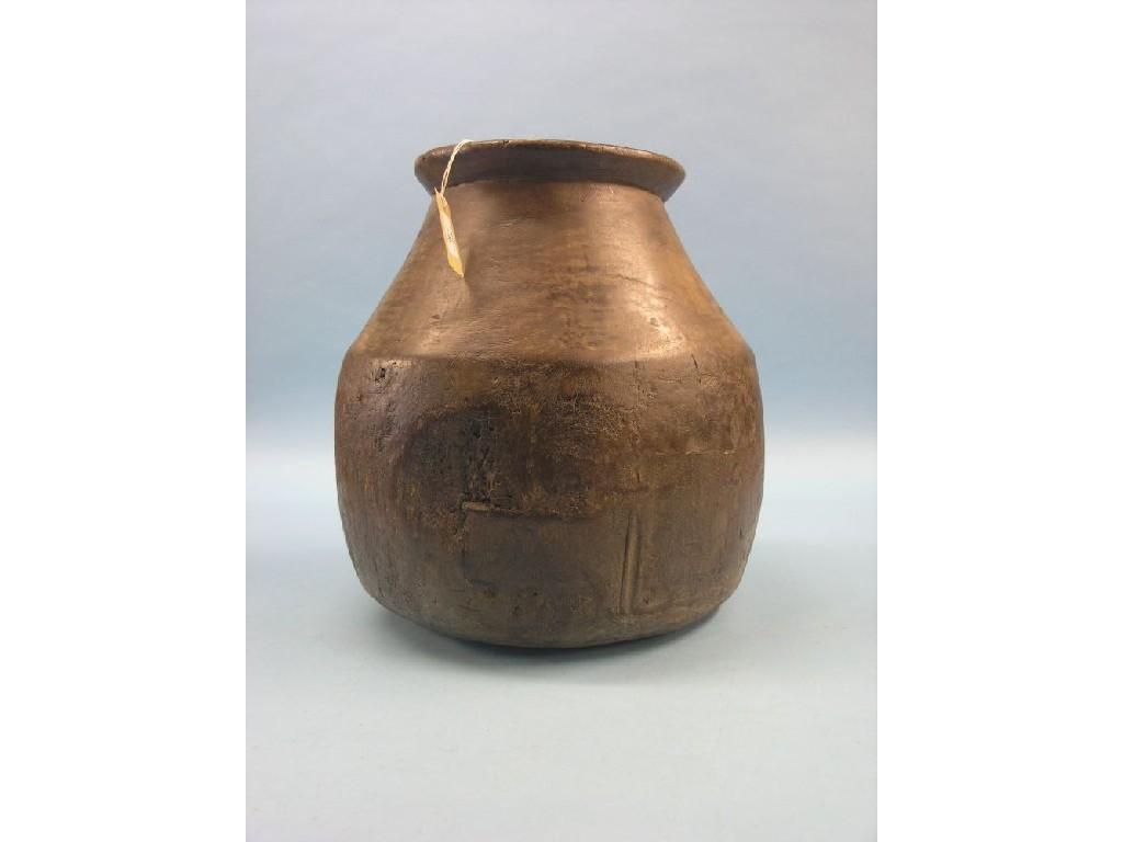 Appraisal: A large African wood water vessel bulbous-shape carved from the