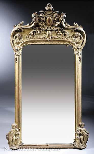 Appraisal: An American Rococo Giltwood Overmantel Mirror mid- th c the