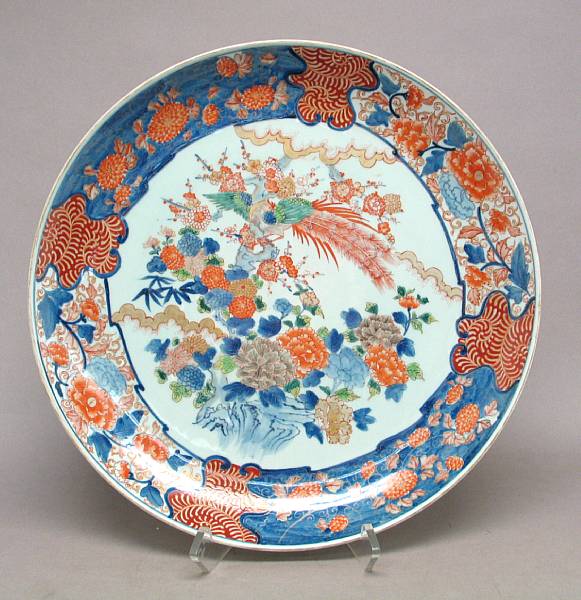 Appraisal: Two pairs of Japanese style porcelain circular chargers Decorated in