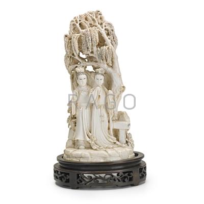 Appraisal: CHINESE IVORY CARVING Official and court lady in a garden