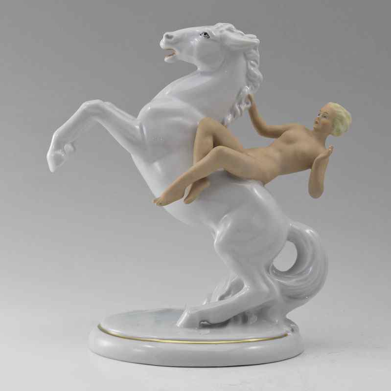 Appraisal: SCHAUBACH KUNST NUDE PORCELAIN FIGURE ON HORSE Figure of a