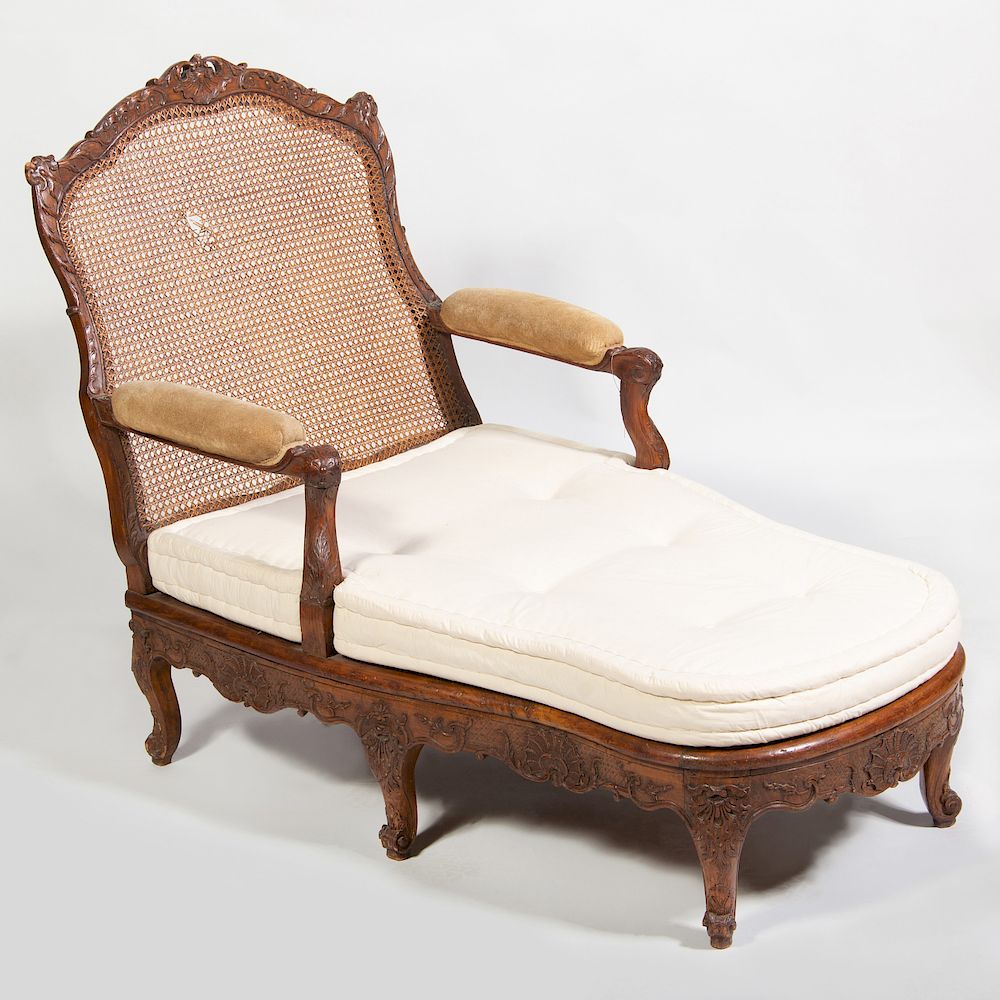 Appraisal: Louis XV Carved Beechwood and Caned Chaise Lounge Fitted with