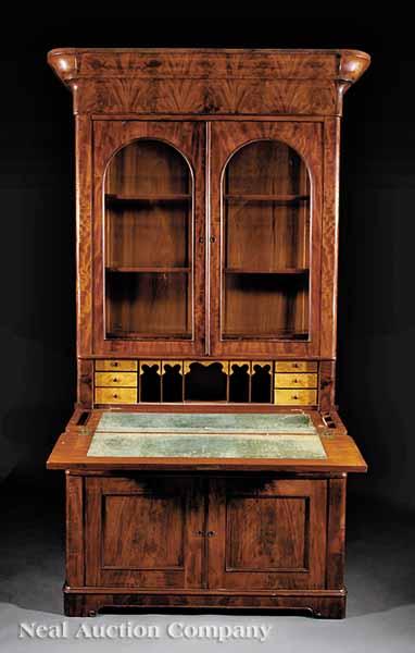 Appraisal: An American Late Classical Carved Mahogany Desk and Bookcase c