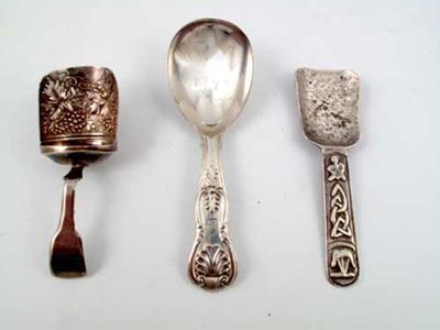 Appraisal: Three caddy spoons a Celtic example maker 'IMC' of long