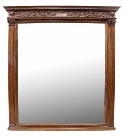 Appraisal: Italian Renaissance Revival carved walnut mirror th c cornice top