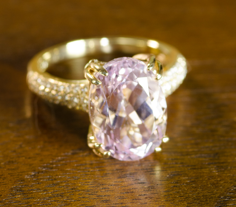 Appraisal: KUNZITE DIAMOND AND FOURTEEN KARAT GOLD RING with round-cut diamonds