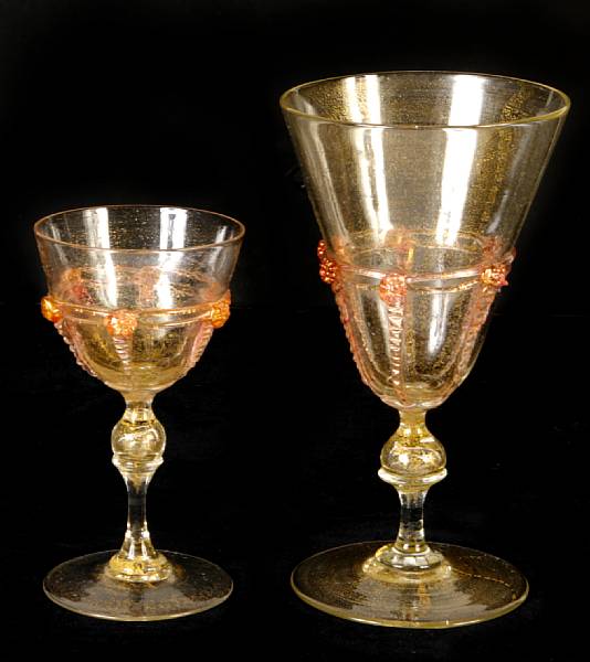 Appraisal: A set of Venetian stemware comprising eight goblets ten coupes