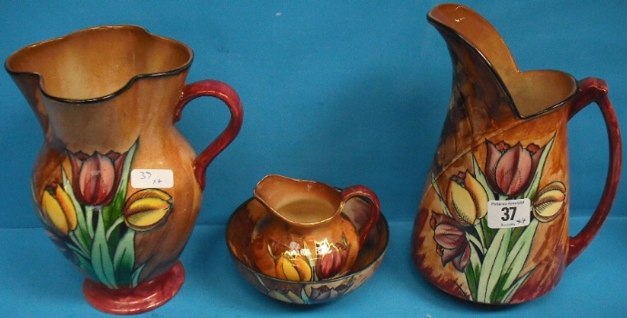 Appraisal: H K Hand Painted Pottery tulip time jug cm Two