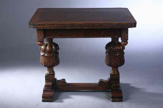 Appraisal: ENGLISH RENAISSANCE REVIVAL CARVED OAK DOUBLE-PEDESTAL DRAW-LEAF TABLE th century