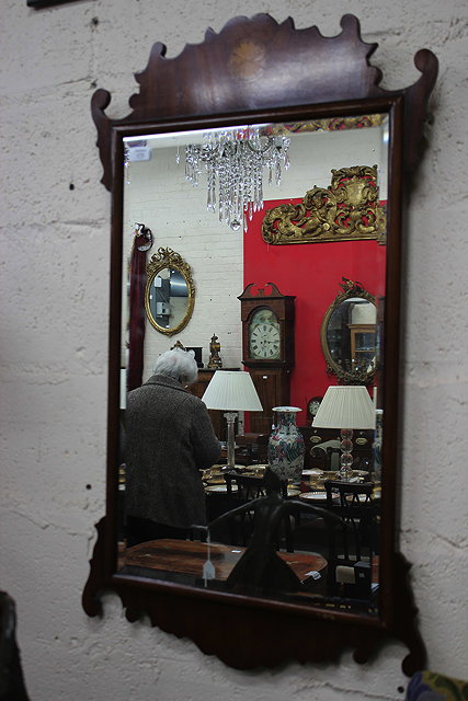 Appraisal: AN TH CENTURY STYLE MAHOGANY FRET FRAMED RECTANGULAR WALL MIRROR