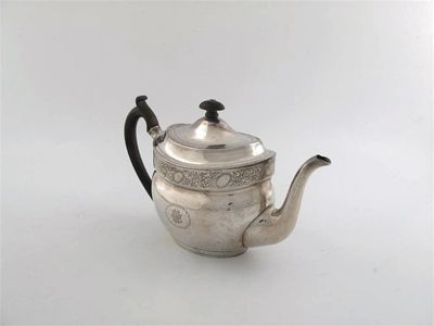 Appraisal: A George III oval teapot with a bright cut frieze