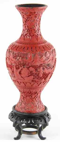 Appraisal: Chinese Cinnabar Vasecarved with figural landscape scenes to baluster body