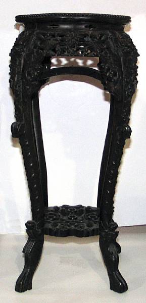 Appraisal: A carved wood footed stand with marble-inset top Late th